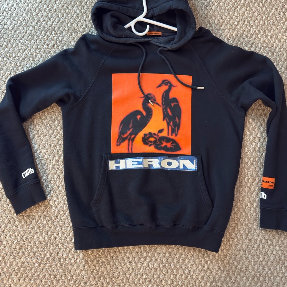 Heron Preston Black Sweater with Orange Heron Design